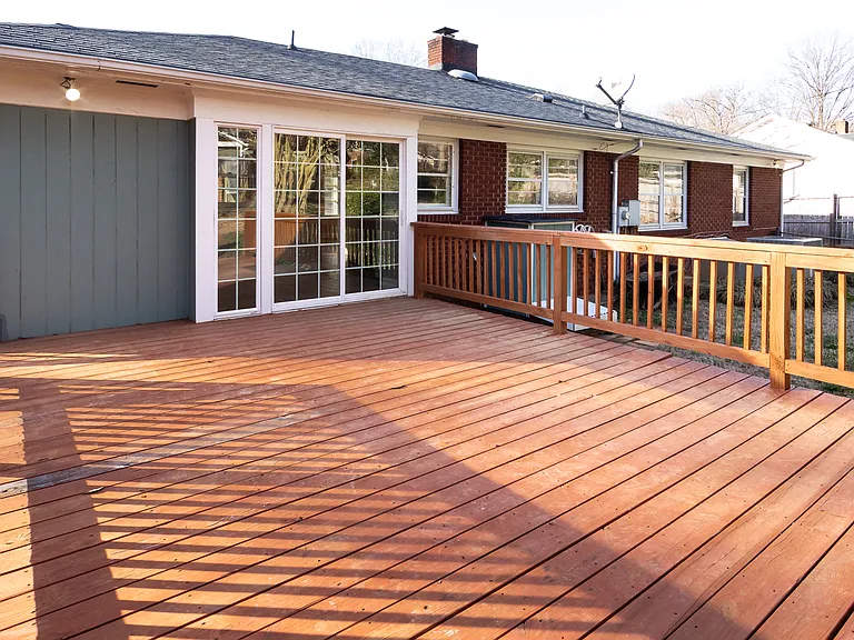 BACK YARD, HUGE DECK THAT COMES OFF KITCHEN
