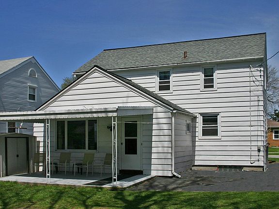 A generous yard and rear entrance tahes you to the family room.