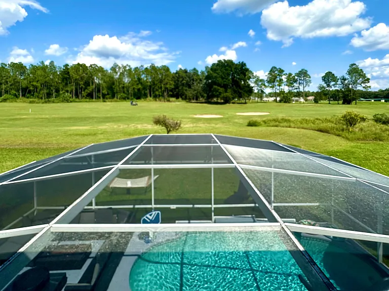 The backyard offers stunning views of your private pool, championship golf course, and resort clubhouse with incredible amenities like Lap Pool, Pickleball, Tennis, and Children's Playground.