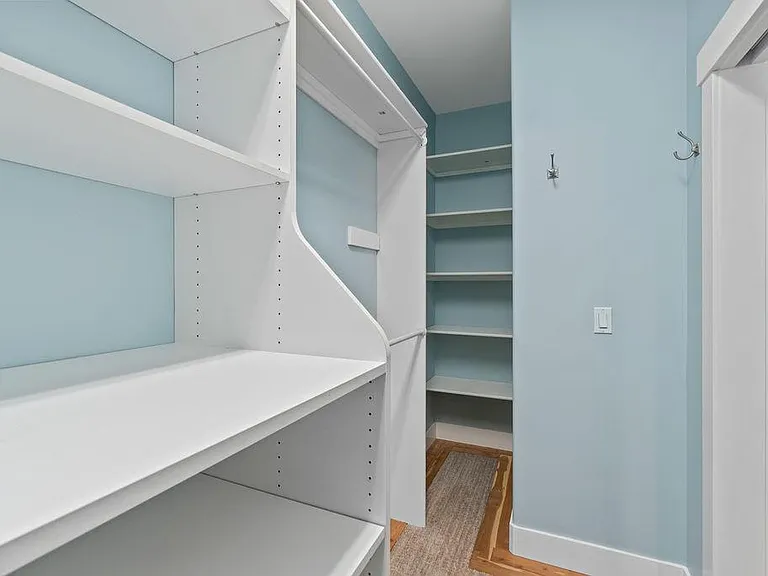 Large Master Bedroom Walk-in Closet with Built-ins