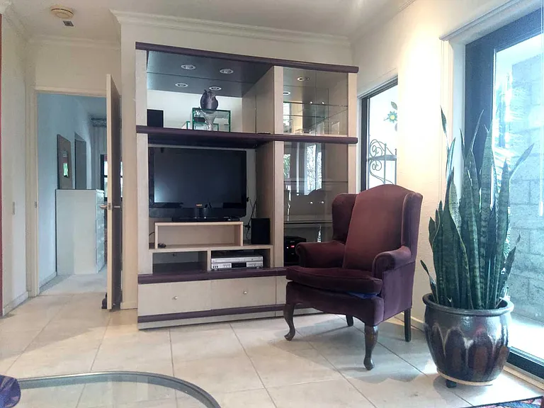 VIEW TOWARDS PRIMARY SUITE WITH AMPLE CLOSET SPACE