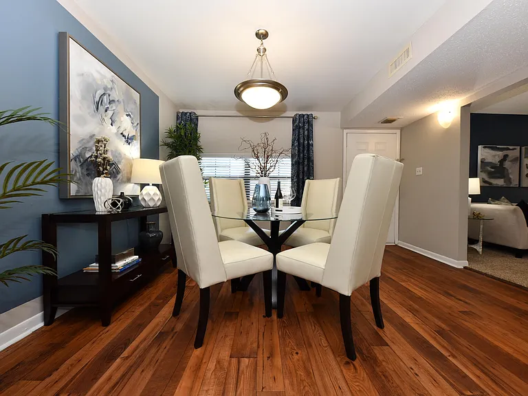 Dining area with hardwood-style flooring