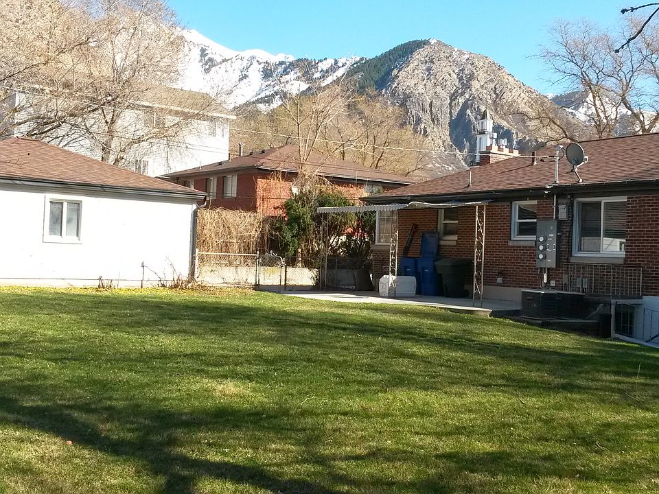 Rear yard looking East to Mount Ogden and shared BBQ patio