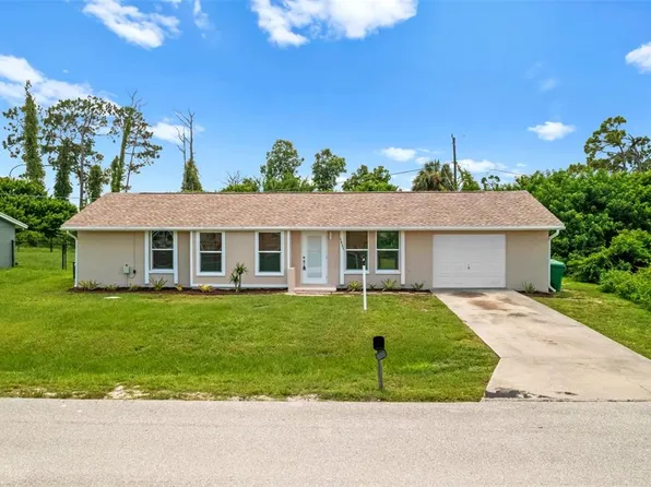 1057 Tropical Ave NW, Pt Charlotte, FL 33948