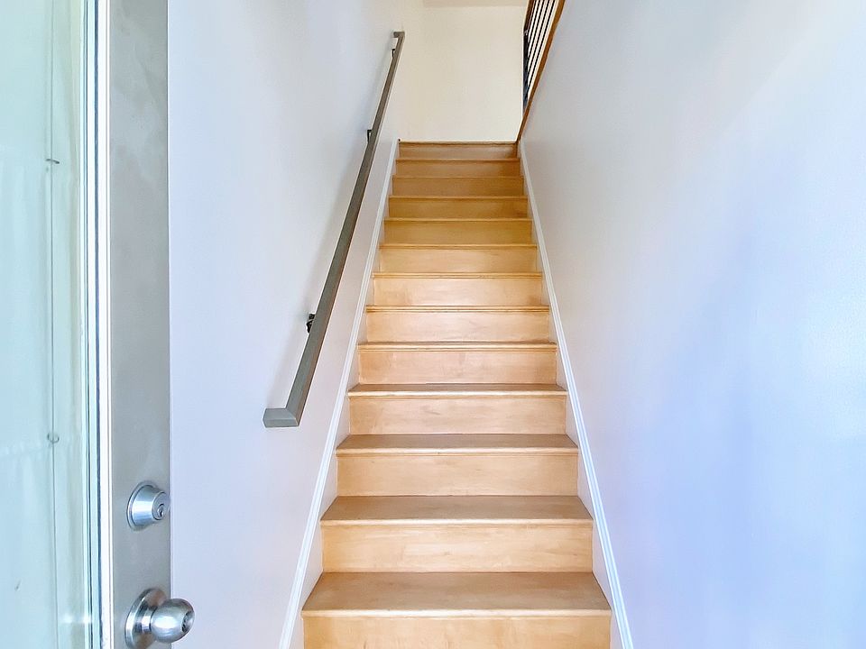 Stairs to the open concept living area