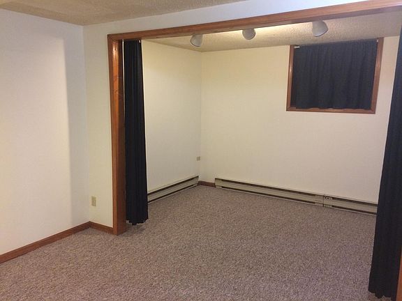 Living room with new carpet.