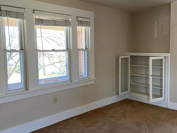 Living Room overlooking Porch and Lexington Ave.