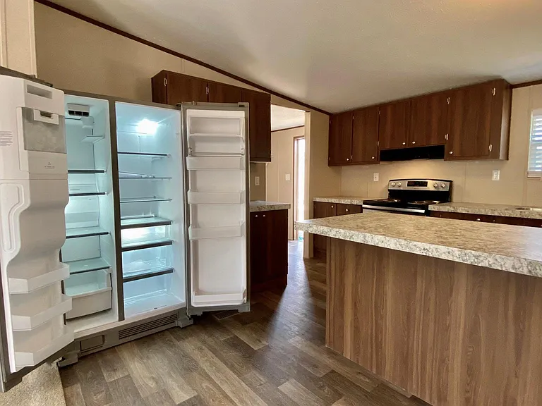 New stainless steel double wide fridge with ice maker