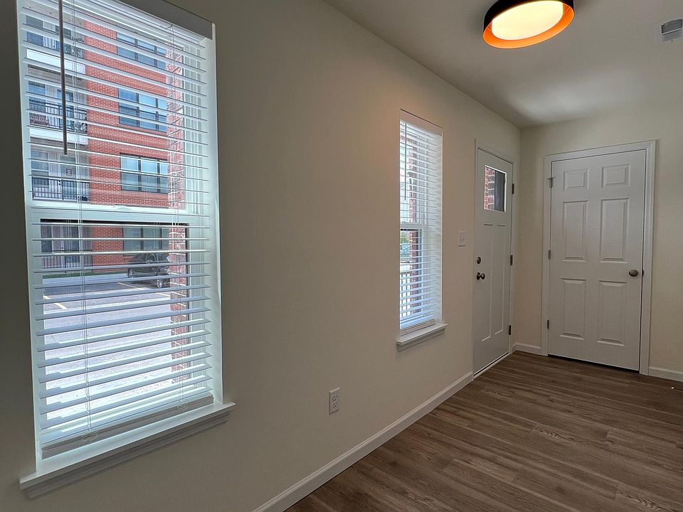 Entry foyer with front porch, closet and direct access to garage.
