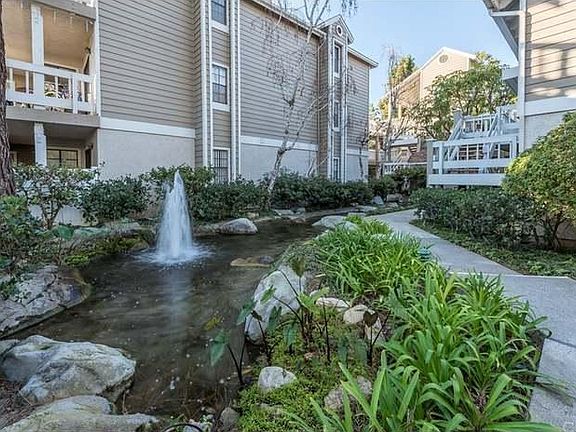 Path from carport to condo.
