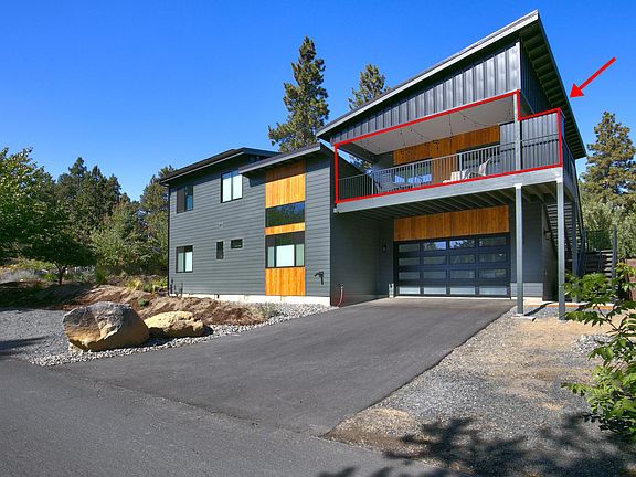 Villa on top, garage is not used and not included with villa rental. additional parking to left in the gravel area.