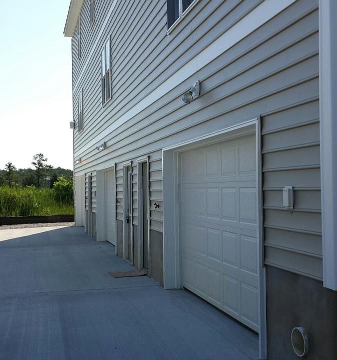 Tri-plex Condo with oversized 2 car garage!
