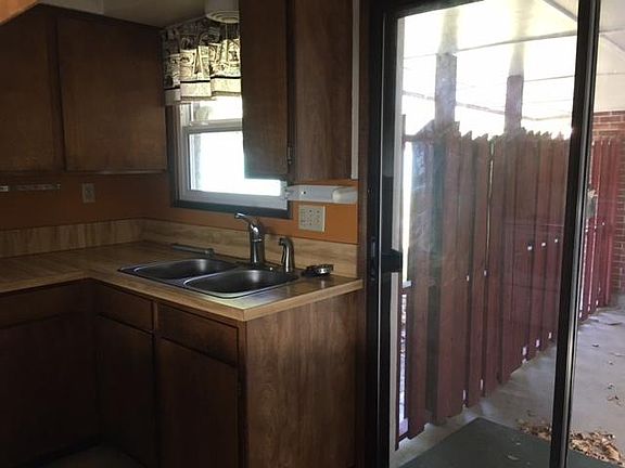 Kitchen looking out to carport