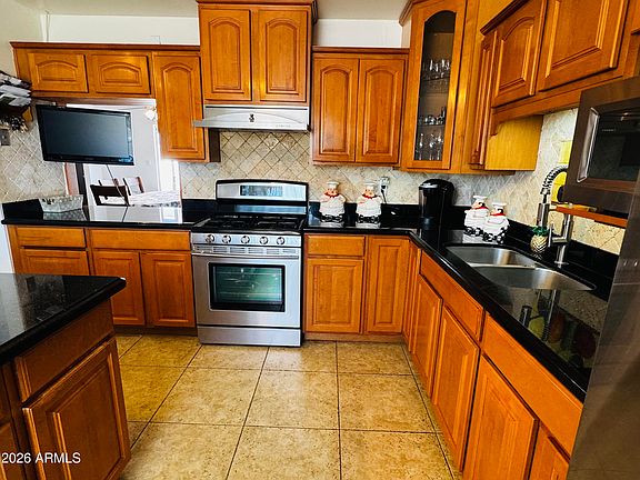 5th image of 7248 E LEWIS Avenue