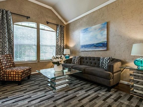 Formal living area. Lots of windows make home light and bright!