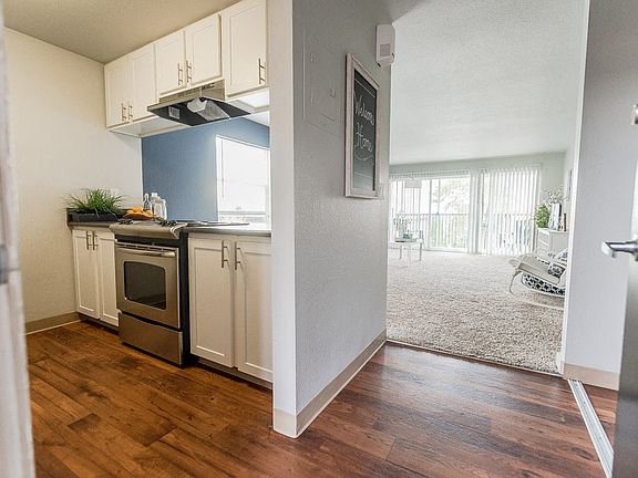 Renton Apartments - The Aviator Apartments - Entryway, Kitchen, and Living Room