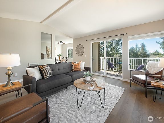 Western exposure with walls of windows and bright as can be. All new LV plank flooring>