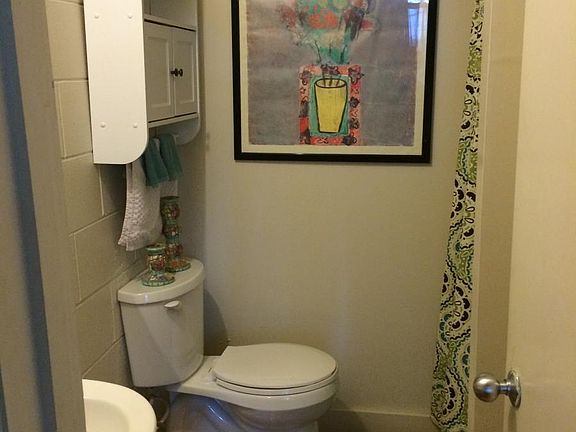 One Bathroom with wood floors, shower