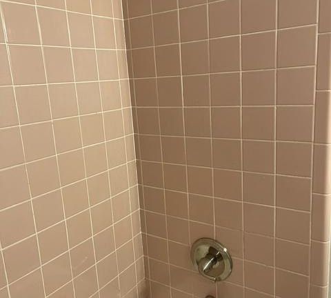 Vintage tile and a deep tub for soaking.