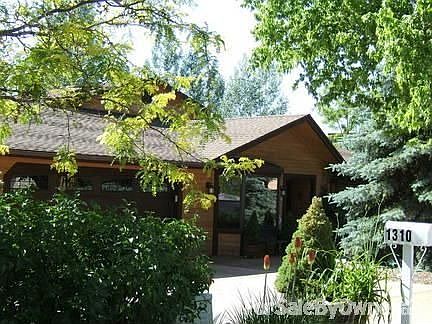 1310 N. Aztec St
						:
						Garage and Driveway