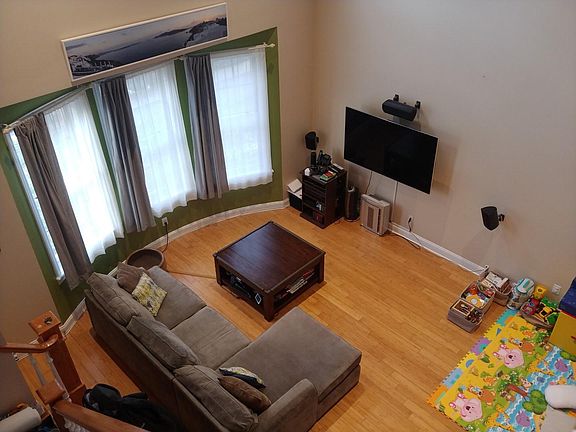 This is the living area and dining area from the 2nd floor. We used the dining area as a play area for our kids.