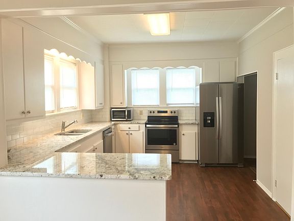 Renovated kitchen with new stainless appliances