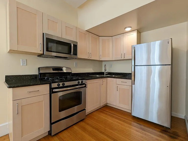 Kitchen area w/ stainless steel appliances