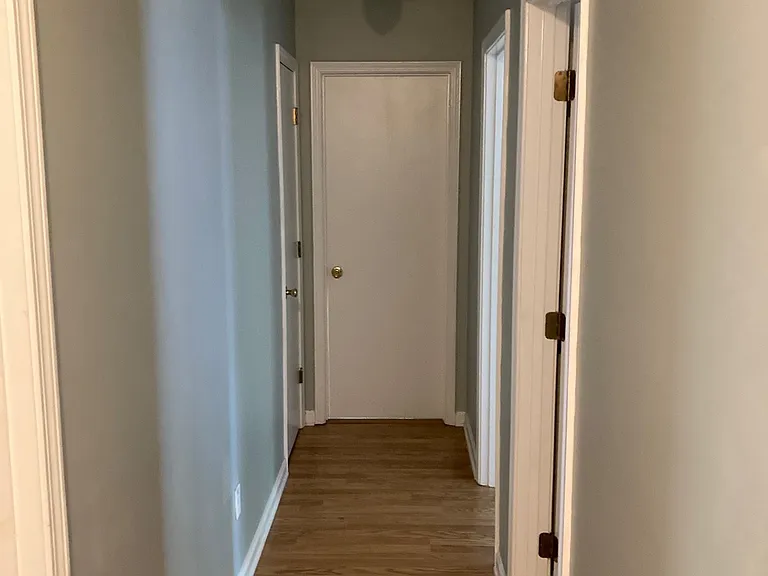 Upstairs hallway with laminate flooring