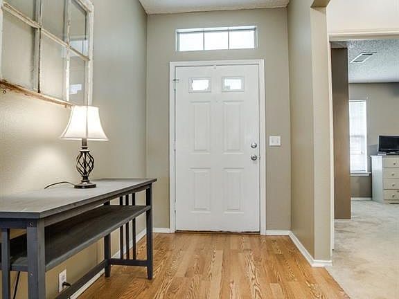 Front entry with wood laminate floors