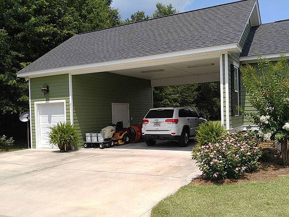 Carport & Attached Storage 