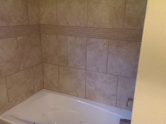 Tiled Shower with jetted tub