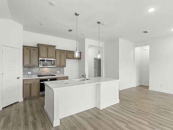 Trenton one-story floor plan featuring 3 bedrooms, 2 bathrooms, open-concept living and dining space