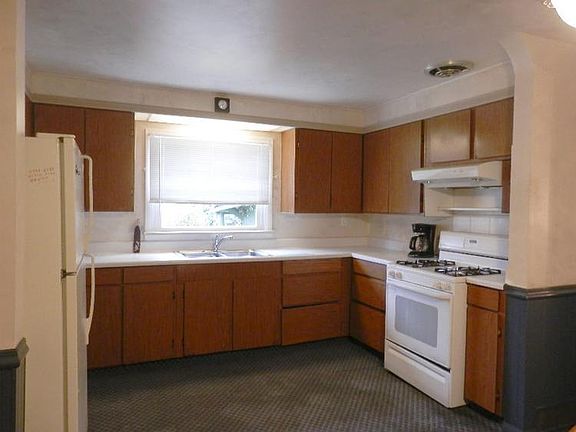 Spacious kitchen with lots of cabinets plus gas range/stove