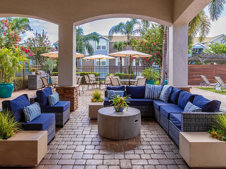 Whether you're hosting friends or enjoying a quiet moment, our poolside lounge offers a chic and comfortable escape steps from the water.