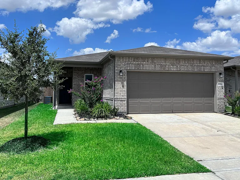 Built in 2020, this stunning home has lovely curb appeal, a well-manicured lawn with a 4 zone sprinklers system, beautiful landscaping, brick elevation, traditional style, beautiful outdoor lanterns, and a double wide driveway!