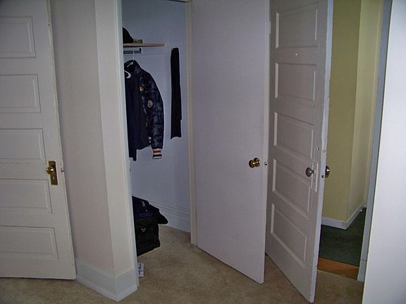same two closets in the one bedroom
