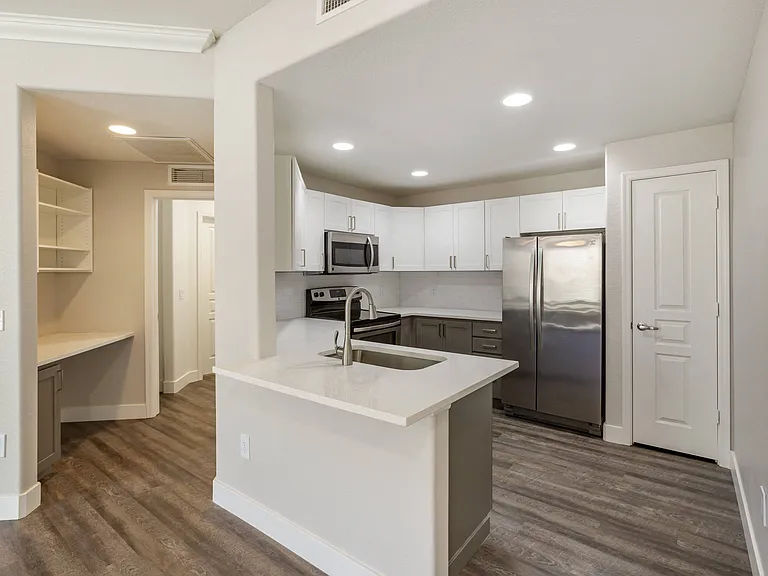 A modern kitchen featuring stainless steel appliances
