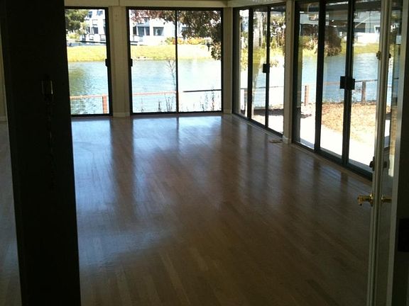 hardwood flooring thru out- Floor to ceiling windows offer g