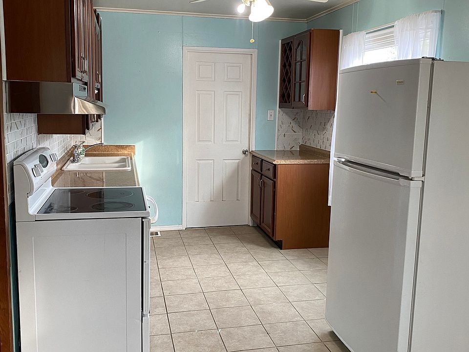 A second shot of the kitchen from a wider angle.