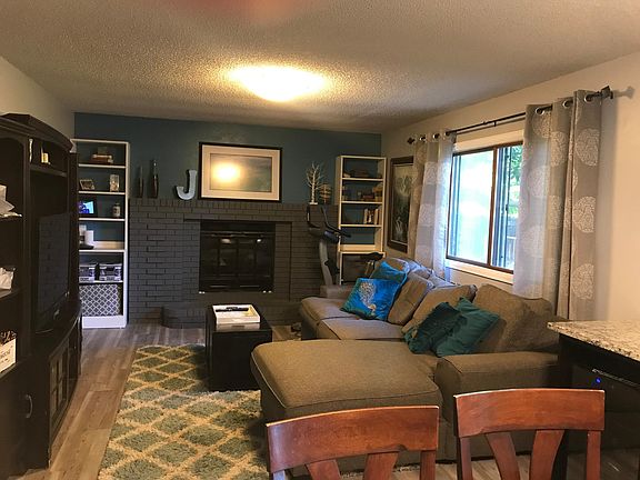 family room with built in cabinets. house is wired for Fort Collins connection internet service