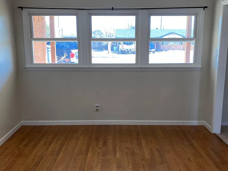 Opposite view of living area. Lots of natural light. Energy efficient windows.