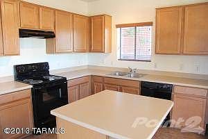 Kitchen with Rich Wood Cabinets