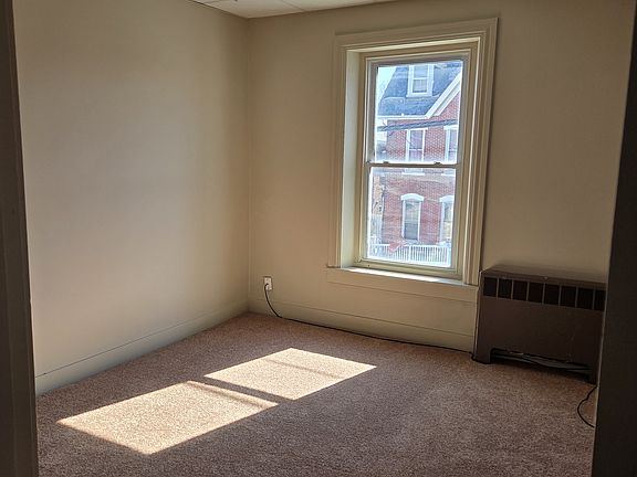 spacious bedroom with large closet