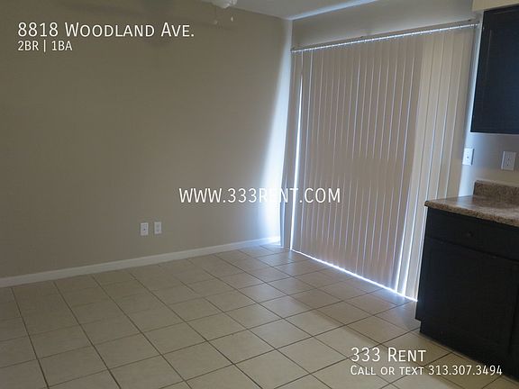 4th image of 8818 Woodland Ave