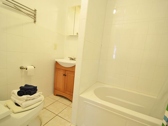 5th image of 353 E 58th St APT 3