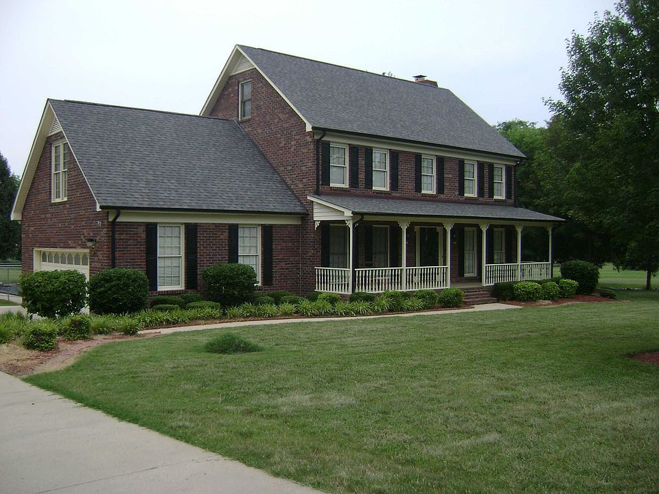 This beautiful 2-story brick home is on a 1.65 acre lot in the Ca