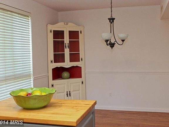 Note. The hutch is removed and the light fixture has been up