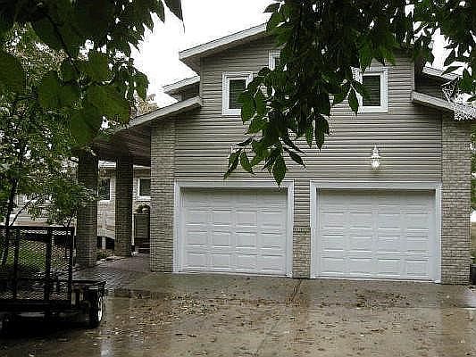 Garage. Bonus room above.