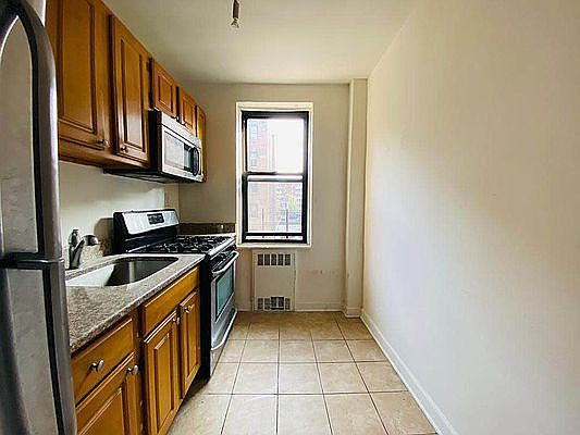 3rd image of 66-15 Wetherole St #C21