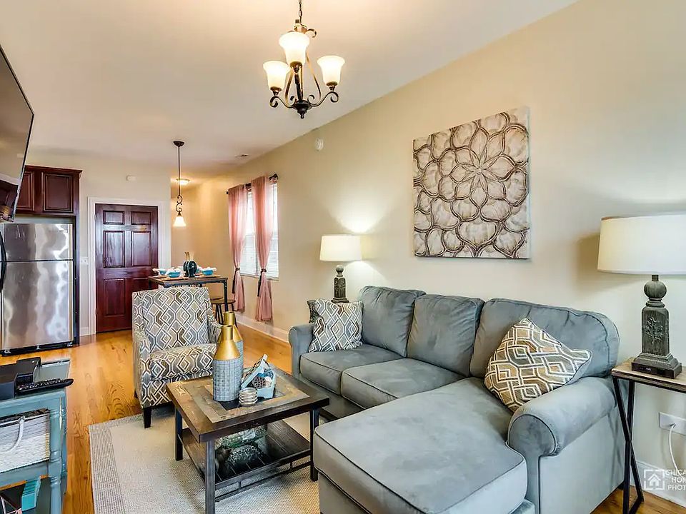 Cozy living room with a queen pull out bed. Plenty of space to watch 50 inch roku TV